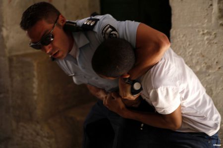 Palestinian-youth-arrested-by-Israeli-soldiers-in-al-aqsa-mosque04
